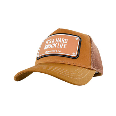 GORRA JOHN HATTER IT"S A HARD KNOCK LIFE
